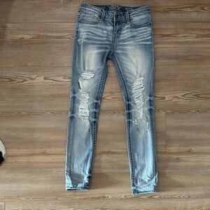 Buckle Light Blue Distressed Skinny Jeans